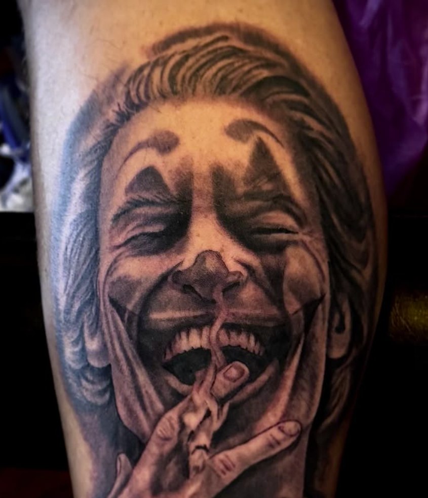 Black and grey Joker portrait tattoo by David Mariscal